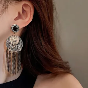 Vintage gold-toned portrait coin drop earrings featuring long metal chain tassels for women
