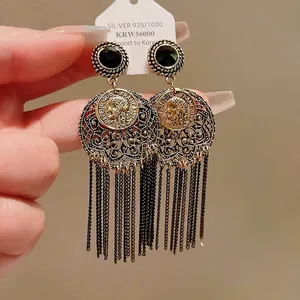 Vintage-style coin tassel earrings with black stones and S925 silver needles, elegant look.