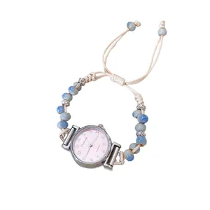 Elegant bohemian beaded watch bracelet with ceramic beads and a woven beige cord.