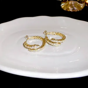 Elegant French style gold plated hoop earrings with shimmering cubic zirconia stones