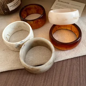 Stylish marbled acrylic bangles set with tortoiseshell and white resin finish for women