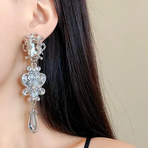 Elegant silver-tone long drop earrings featuring clear square and waterdrop stones for women