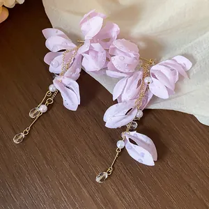 Elegant lavender fabric flower drop earrings with white pearls and sparkling crystals