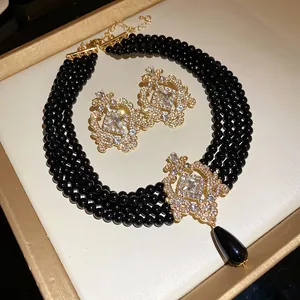 Exquisite vintage multi-layer black bead necklace and matching teardrop earrings jewelry set