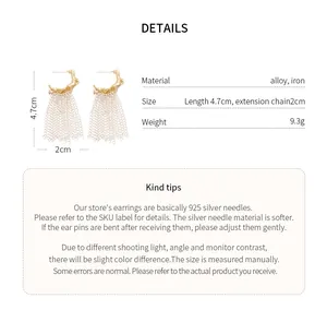 Detailed specs for gold tassel earrings, 4.7cm length with silver needle material info