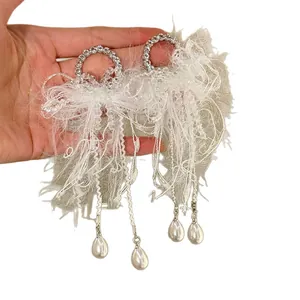 Elegant silver needle drop earrings with white tulle bow and water drop pearls