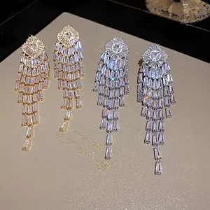 Elegant gold and silver plated cubic zirconia tassel drop earrings for evening dresses.