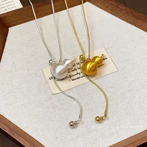 Elegant brushed gourd pendant adjustable necklace in gold and silver finish