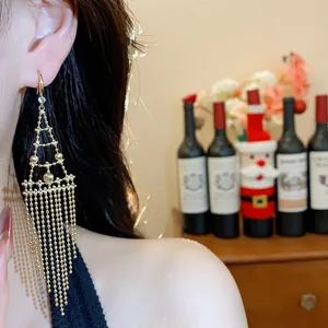 Elegantes pendientes largos de borla geométrica dorada con flecos de cuentas