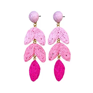 Handcrafted bohemian multi-tier pink raffia woven dangling earrings with gold rings