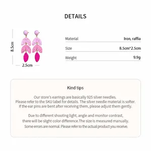 Detailed specification of raffia drop earrings with size and material info