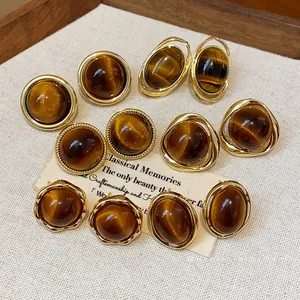 Vintage Maillard style gold-plated resin stud earrings in various geometric shapes