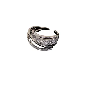 Elegant silver multi-layer crisscross open ring with sparkling zircon stones for women.