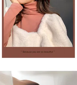 Detailed shot of a female model wearing a stylish pink turtleneck and white faux fur vest