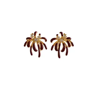 Elegant 18k gold-plated firework stud earrings with burgundy enamel and clear zircons