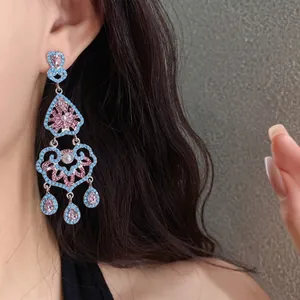 Boucles d'oreilles style palais vintage avec perles turquoise, cristaux roses et perles