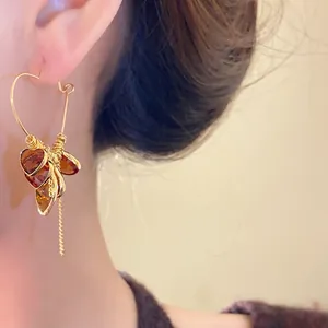 Vintage 18K gold plated heart hoop earrings with amber stone tassels and elegant style