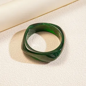 Vintage style irregular dark green resin bangle bracelet with unique polished finish for women