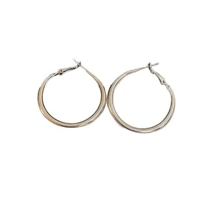 Minimalist silver-plated oval hoop earrings with a sleek polished finish for women