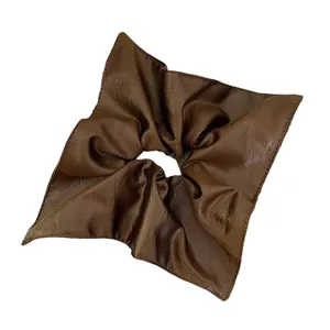 Elegant retro brown faux leather square scrunchie hair tie with soft ruffled texture