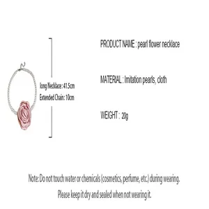 Detailed view of fabric flower pearl necklace with 41.5cm length and care instructions.