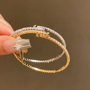 Bracelets joncs ouverts en tons or et argent incrustés de zircons étincelants