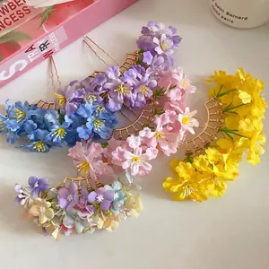 Sweet floral fabric hairpins with golden fan base in vibrant colors