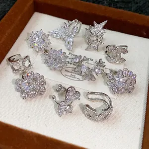 Ear cuff in argento con zirconi scintillanti a forma di farfalla e stella