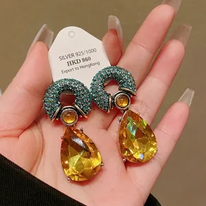 Vintage silver needle waterdrop earrings with blue rhinestones and yellow crystals