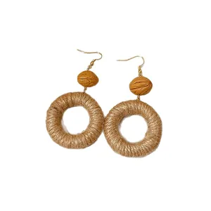 Bohemian jute woven hoop earrings with walnut-shaped beads for a natural beach vacation style