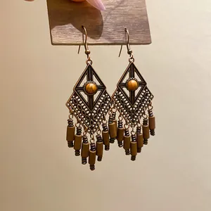 Vintage bohemian bronze geometric dangle earrings with ethnic tassels and brown beads