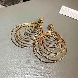 Elegant multi-layer gold circular drop earrings for women featuring minimalist design