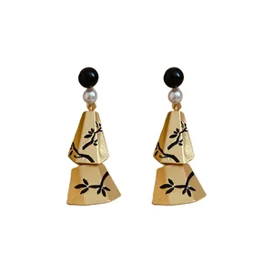 Elegant New Chinese style pearl earrings with vintage branch patterns on golden pendants