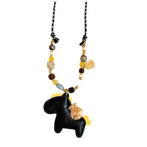 Chic leather horse pendant necklace with colorful wooden beads on a long braided cord