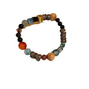 Handmade ethnic style beaded bracelet with natural gemstones and vintage wooden beads