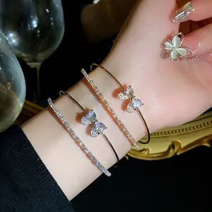 Luxury set of zircon bow bracelets and sparkling baguette stone bangles for women