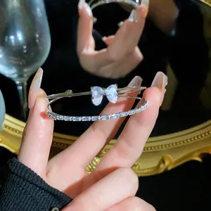 Close-up detail of silver zircon butterfly bangle showing elegant craftsmanship and crystals