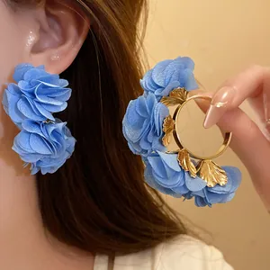 Elegant blue chiffon flower C-shaped hoop earrings for a casual seaside vacation style.