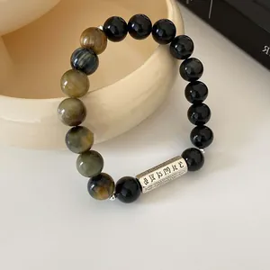 Handgefertigtes Tigerauge- und schwarzes Obsidian-Armband mit Sanskrit-Mantra-Perle