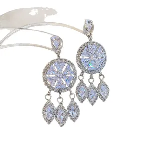 Sparkling silver cubic zirconia earrings with round dreamcatcher drop pendant design