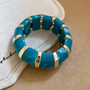 Stylish teal marbled acrylic and gold segment stretch bracelet for women