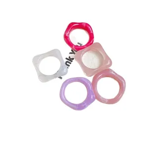 Set of five vintage colorful resin geometric rings with a minimalist fashion design