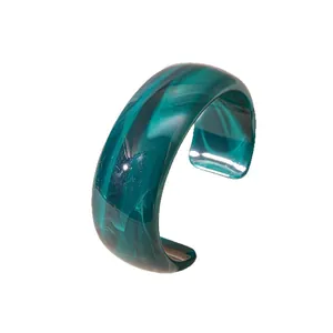 Elegant acrylic marbled irregular wave wide cuff bracelet in deep emerald green finish