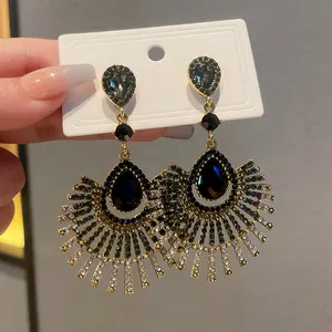 Vintage water drop earrings with radiant rhinestone fringe and navy teardrop stone
