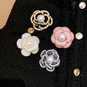 Set of four elegant French style Camellia flower brooches with pearls and tweed texture