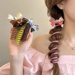 Elegantes Telefonkabel-Haargummi mit Schleife für modische Blasen-Zopf-Frisuren