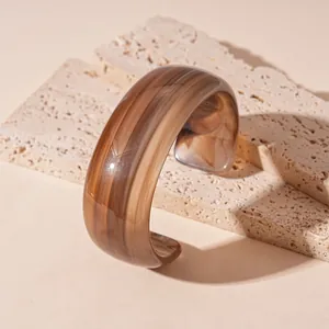 Chic modern brown marbled acrylic wavy wide cuff bracelet with a premium polished finish