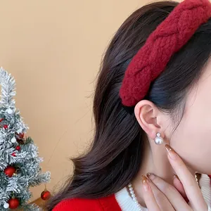 Detailed shot of red braided velvet headband for high skull top look, Autumn winter style