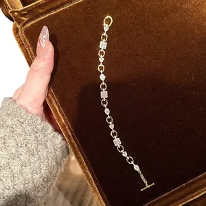 Premium gold-plated bracelet featuring zircon hearts and flowers in a brown velvet box