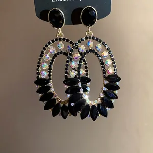 Vintage-style oval drop earrings featuring black faceted stones and AB rhinestones